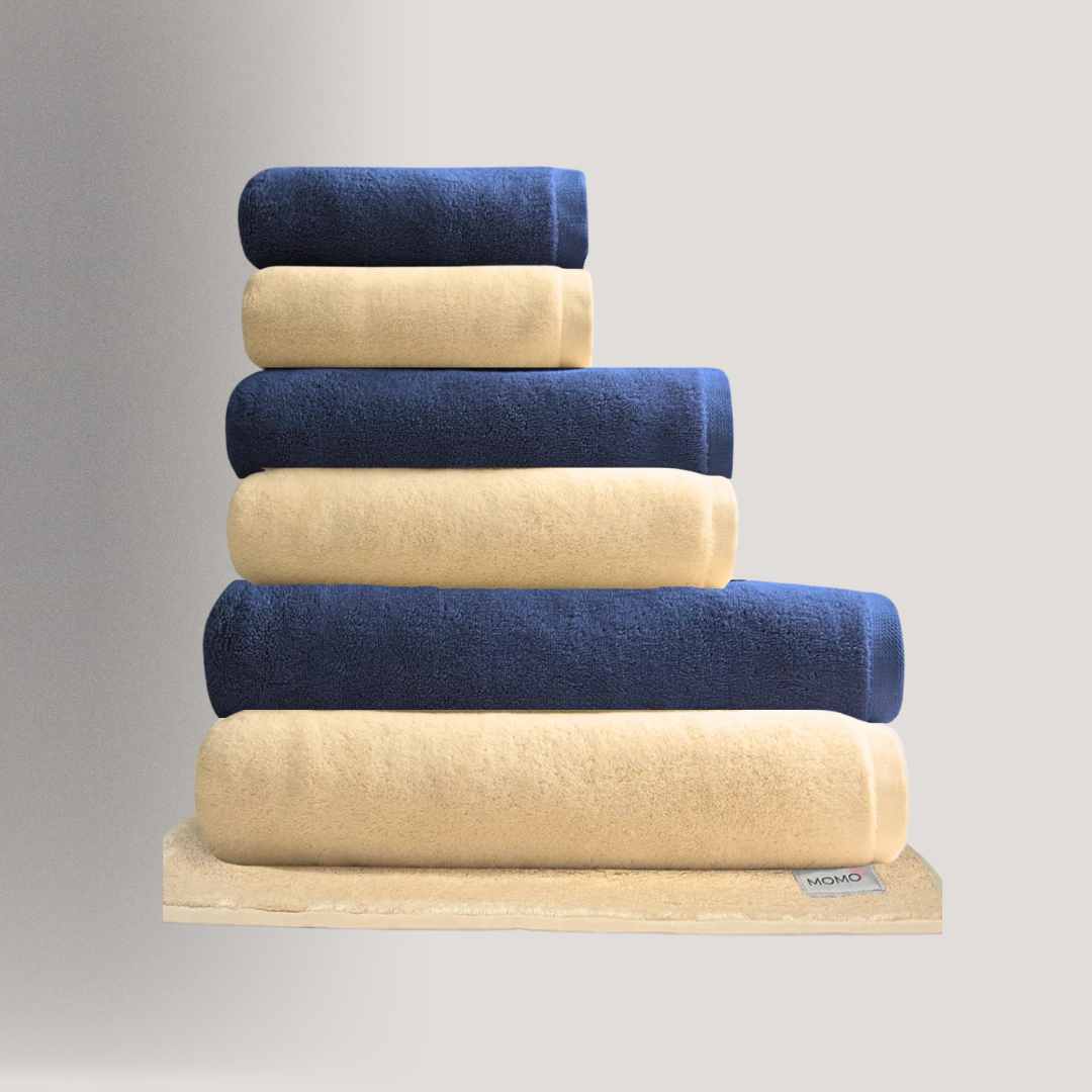 Conjunto de toalhas de algodão e bambu em azul marinho e bege – macias, absorventes e sustentáveis da Momo Cotton
