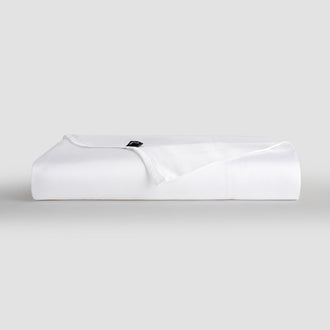 Sábana bajera blanca de bambú Momo Cotton – tejido satén 300 hilos, suave, transpirable y sostenible.