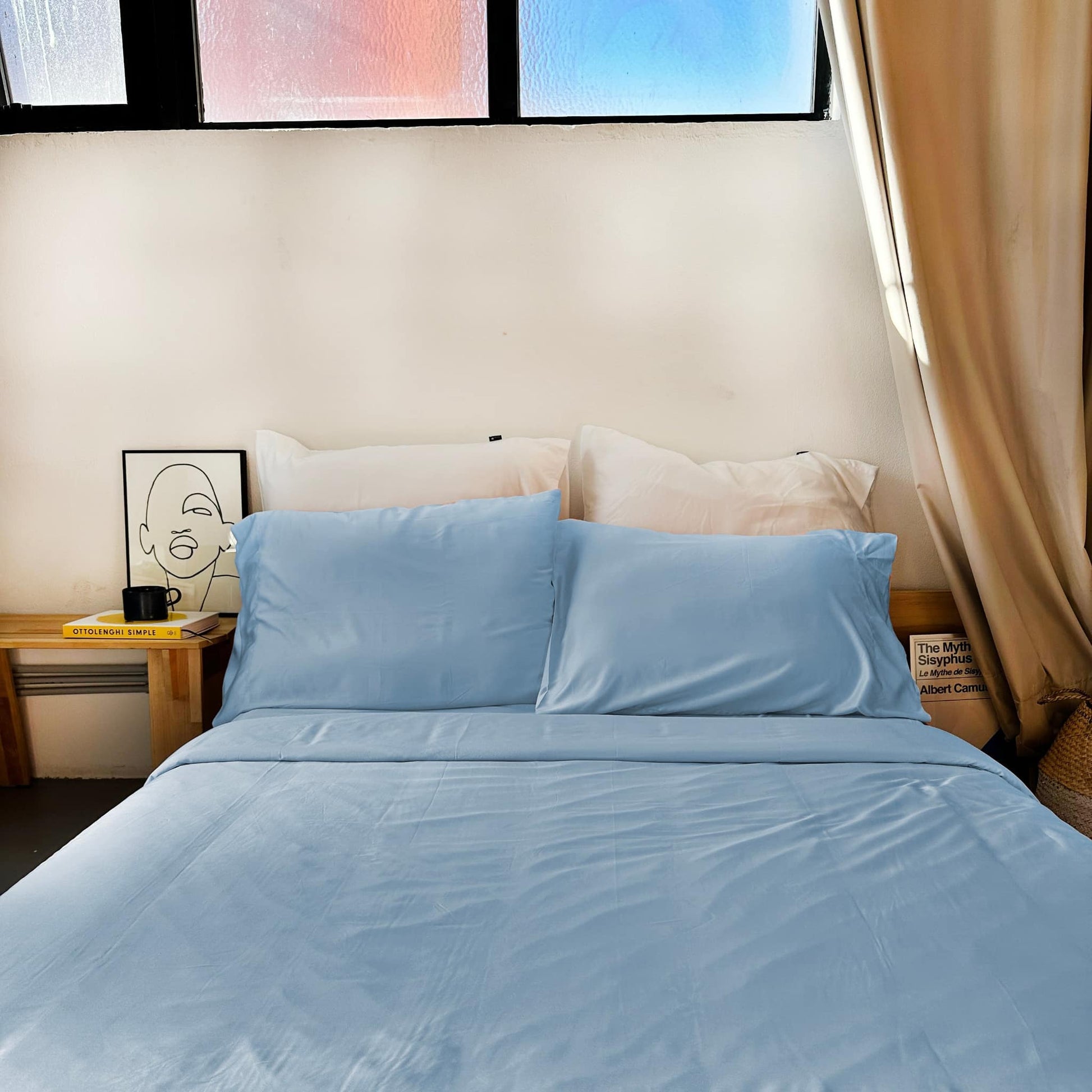 Neat bed with blue bamboo duvet and pillow set – soft, breathable and sustainable bedding