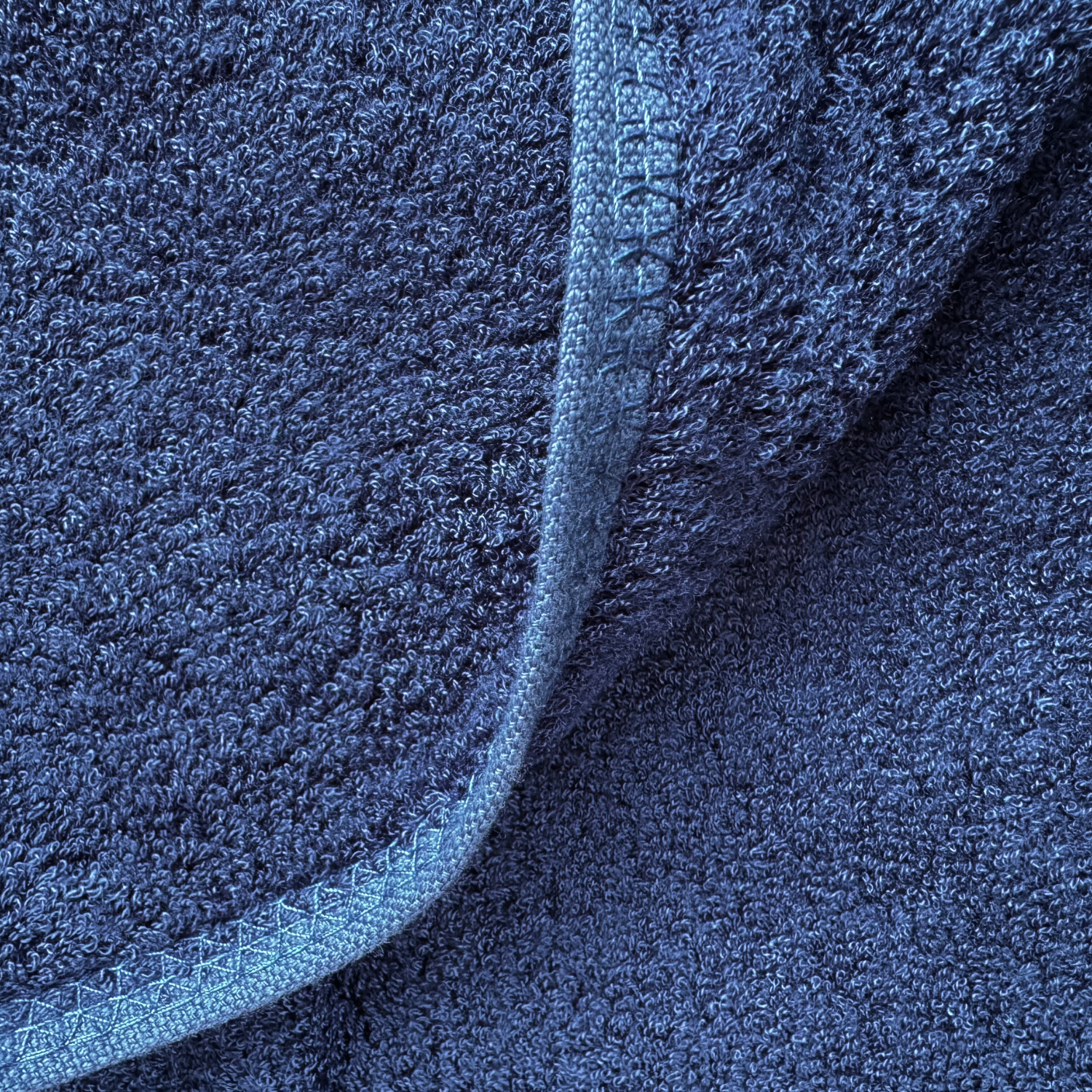 Close-up of blue bamboo towel texture – soft, absorbent and sustainable