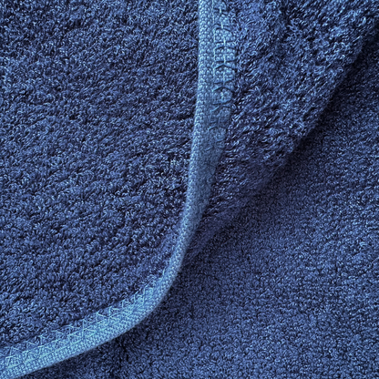Close-up of blue bamboo towel texture – soft, absorbent and sustainable