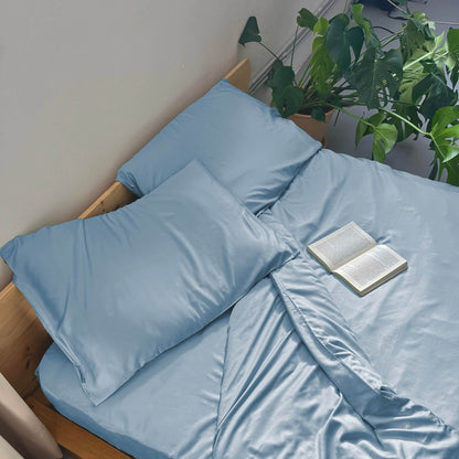 Top view of light blue bamboo duvet set – duvet and pillows, soft, breathable and sustainable bedding