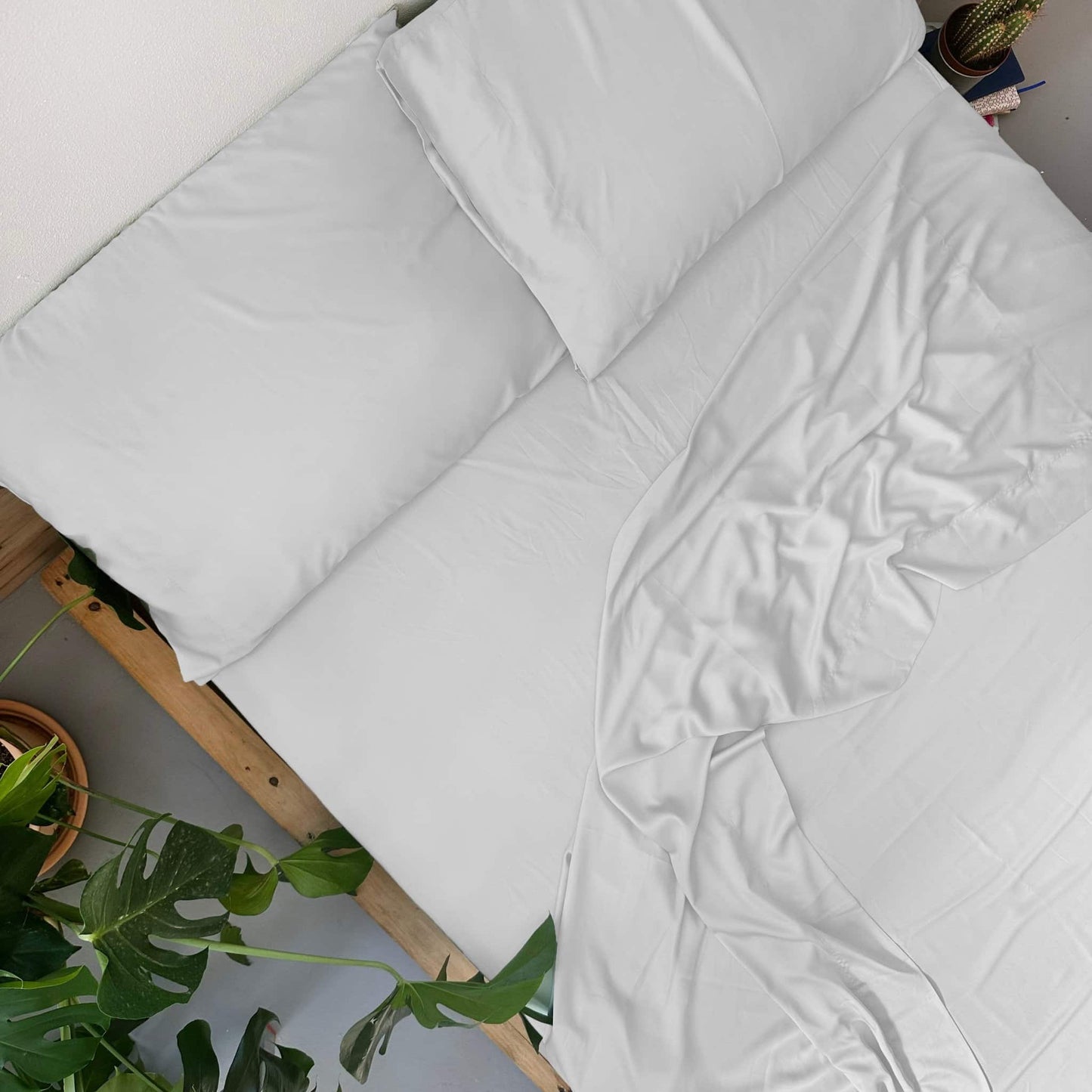 Top view of white bamboo flat sheet set – sheets and pillowcases, soft, breathable and sustainable bedding