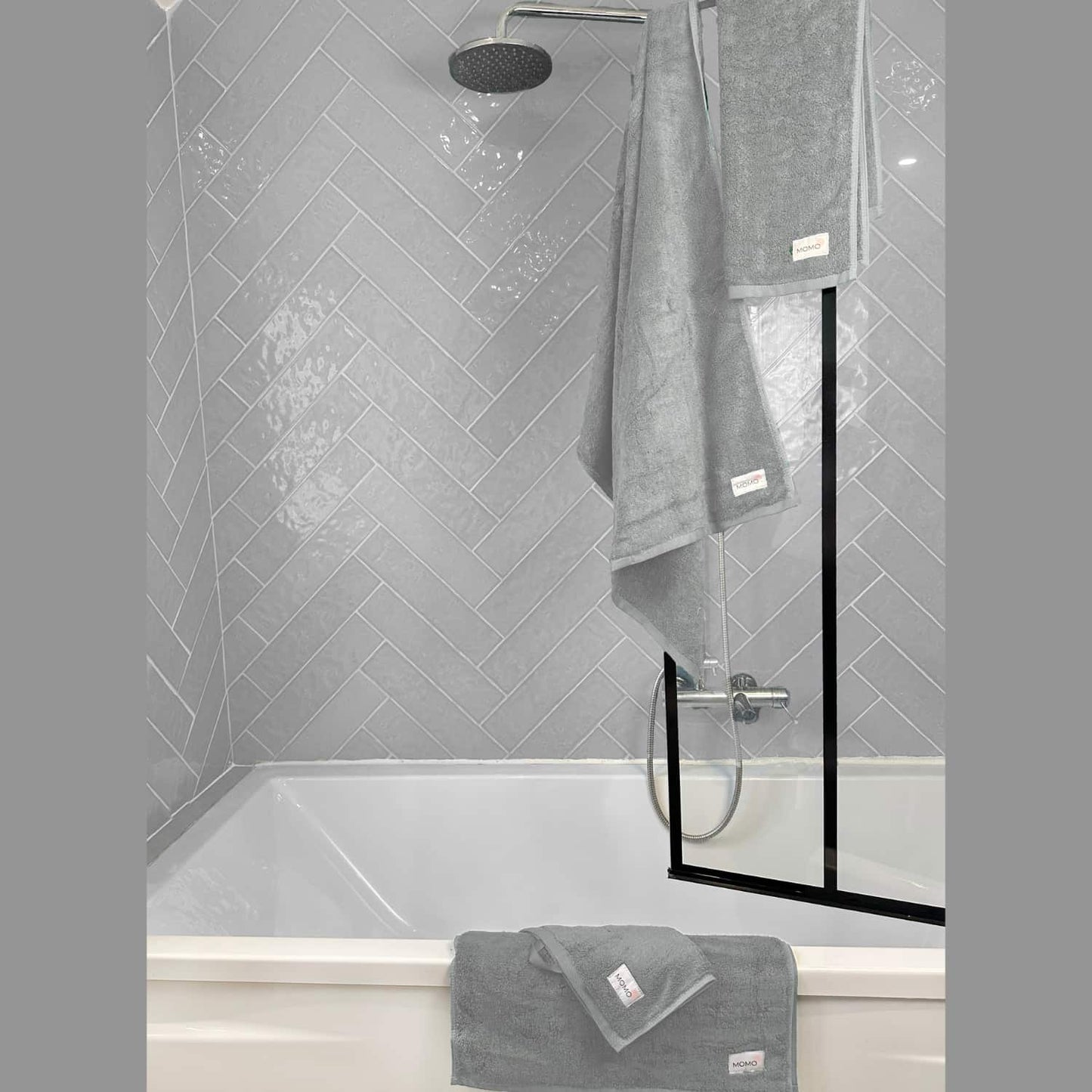 Complete grey bamboo towel set in shower – bath, hand and face towels, soft and absorbent