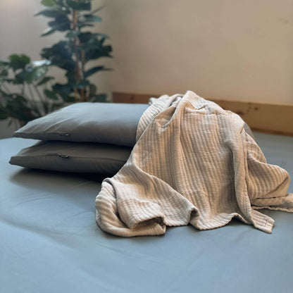 Grey bamboo pillow with blanket – soft, breathable and sustainable bedding