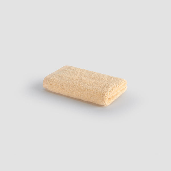Beige bamboo face towel by Momo Cotton – soft, absorbent, quick-drying and sustainable