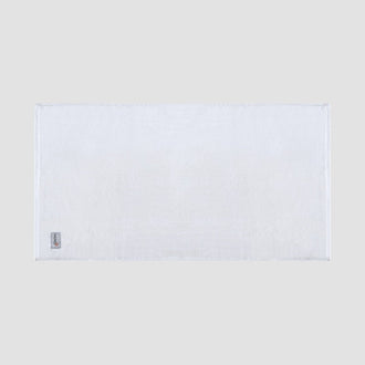 Tapete de baño blanco de bambú Momo Cotton – suave, absorbente, de secado rápido y sostenible.